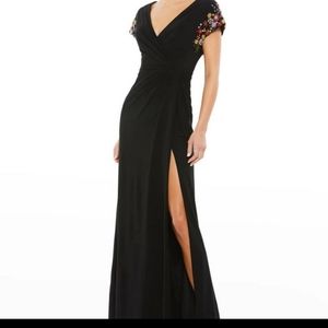 Mac Duggal black gown with bejeweled details. NWT size 12